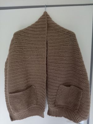 Couvre epaules avec poches