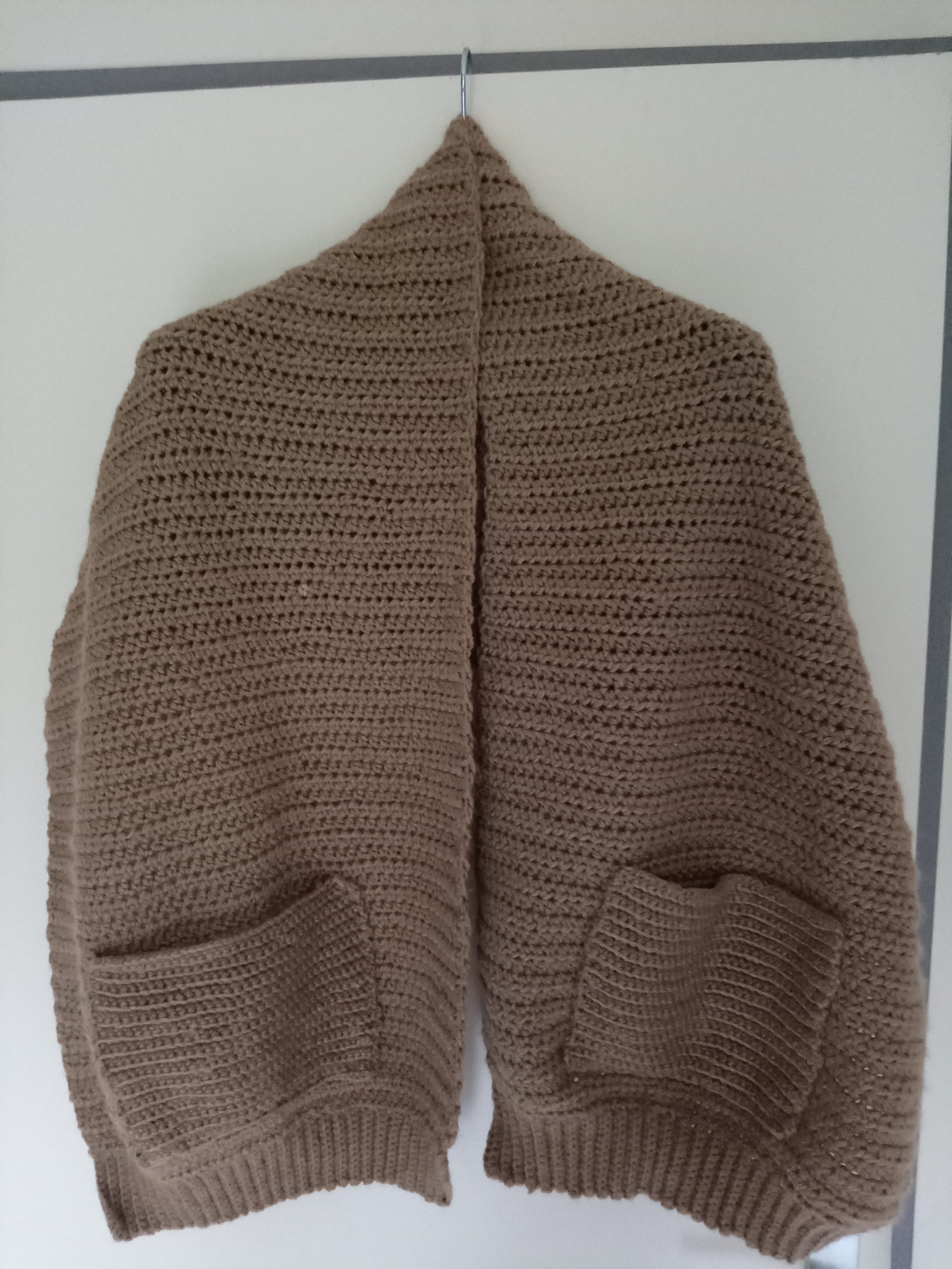Couvre epaules avec poches