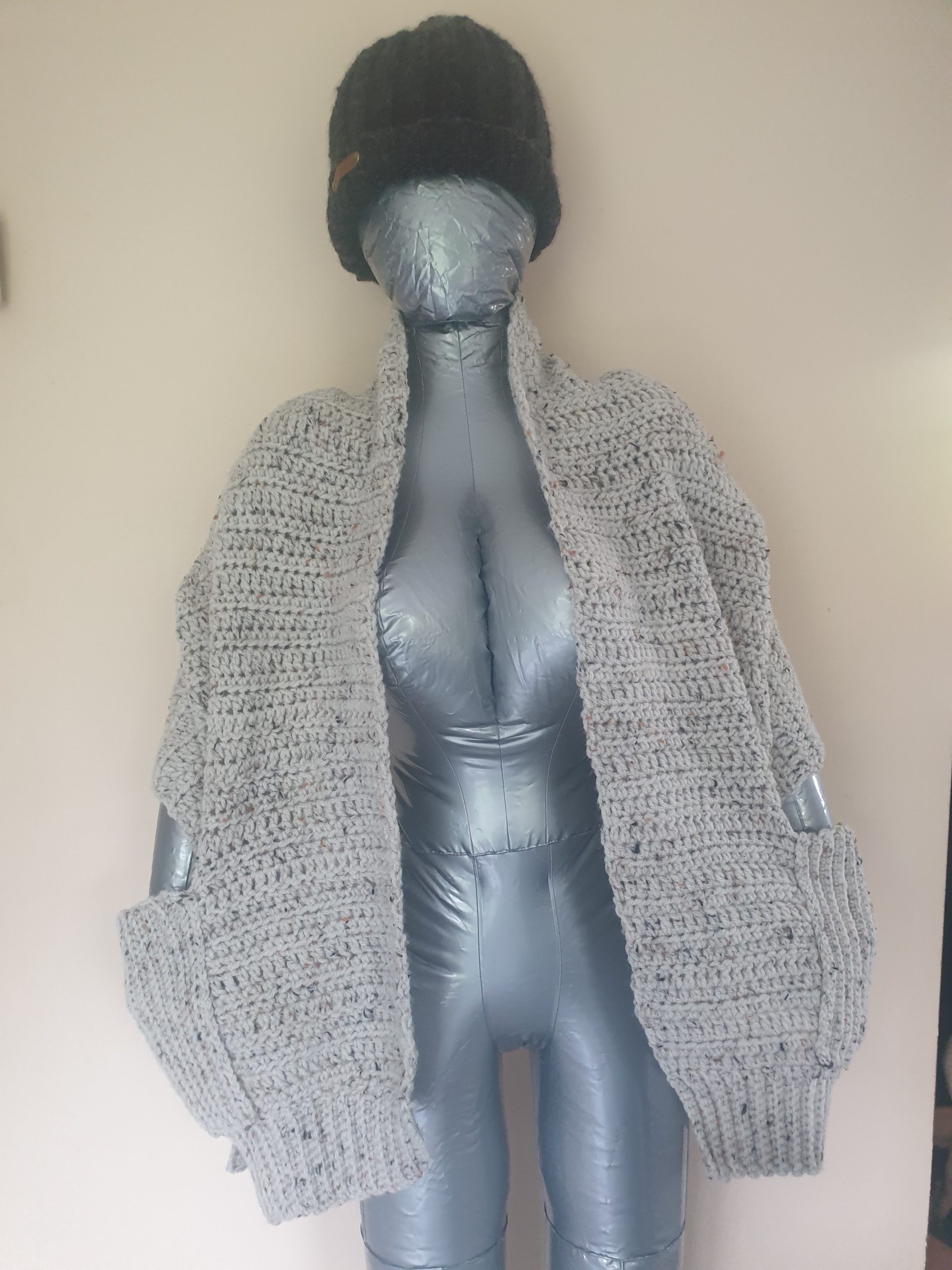 Couvre épaule avec poches